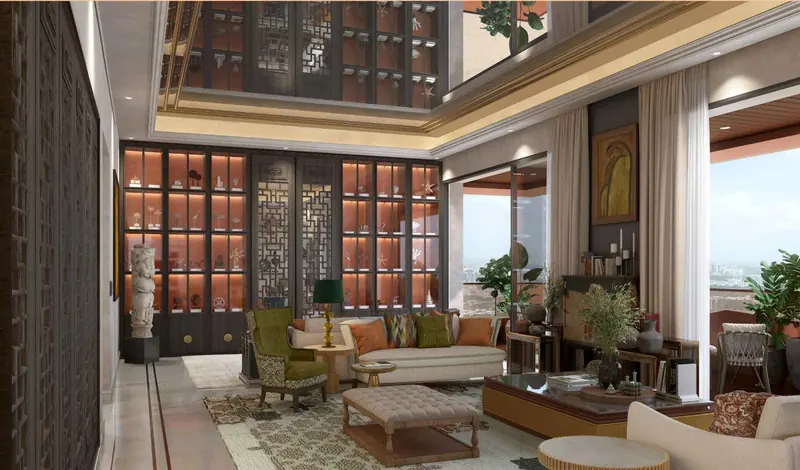 Living room with a double-height ceiling at Sri Aditya Vantage
