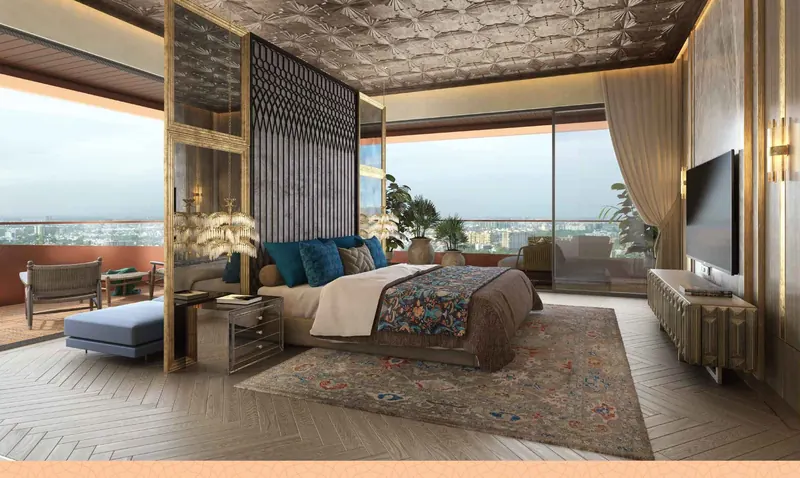 Master bedroom suite with floor-to-ceiling glass at Sri Aditya Vantage